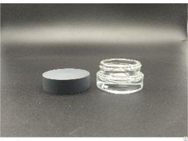 China Low Price Cosmetic Round Jar Screw Neck Press Glass Bottle 10g Supplier