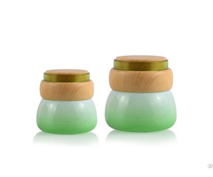 Fashionable Fancy 50ml Green Cosmetic Glass Cream Jar With Wood Grain Cover