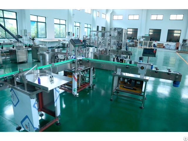 Ce Standard China Essential Oil Filling Capping Machine Line