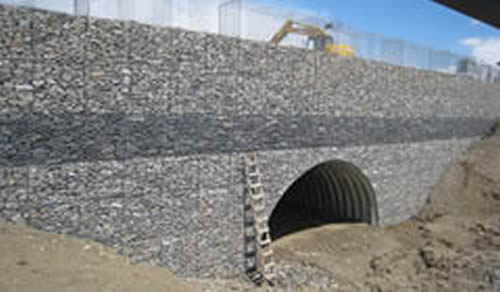 Gabion Wall Gives Retaining In River Embankment And Garden