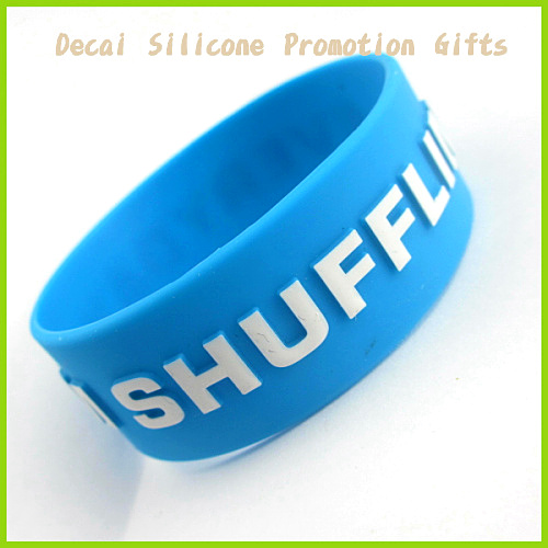 Silicone Cool Wristband Blue Enbossed White Color